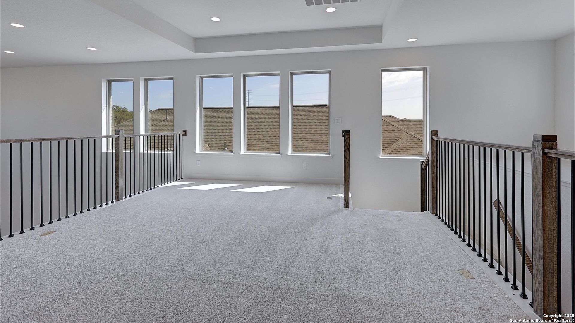 233 Hidalgo Boerne, TX 78006 - Photo 21 of 32 a view of a big room with windows