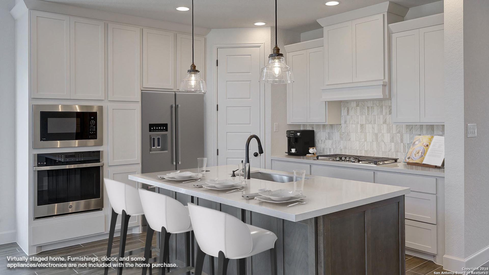 233 Hidalgo Boerne, TX 78006 - Photo 4 of 32 a kitchen with granite countertop a sink cabinets and stainless steel appliances