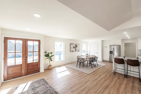 a view of a livingroom with furniture and wooden floor