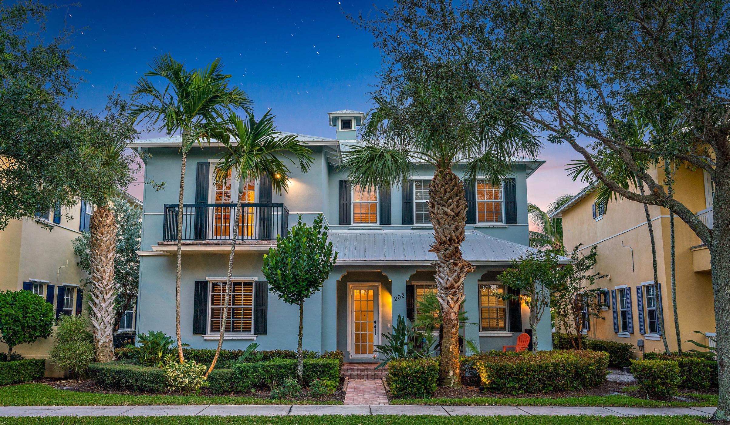 202 Botanica Drive Jupiter, FL 33458 - Photo 1 of 39 front view of house with a street