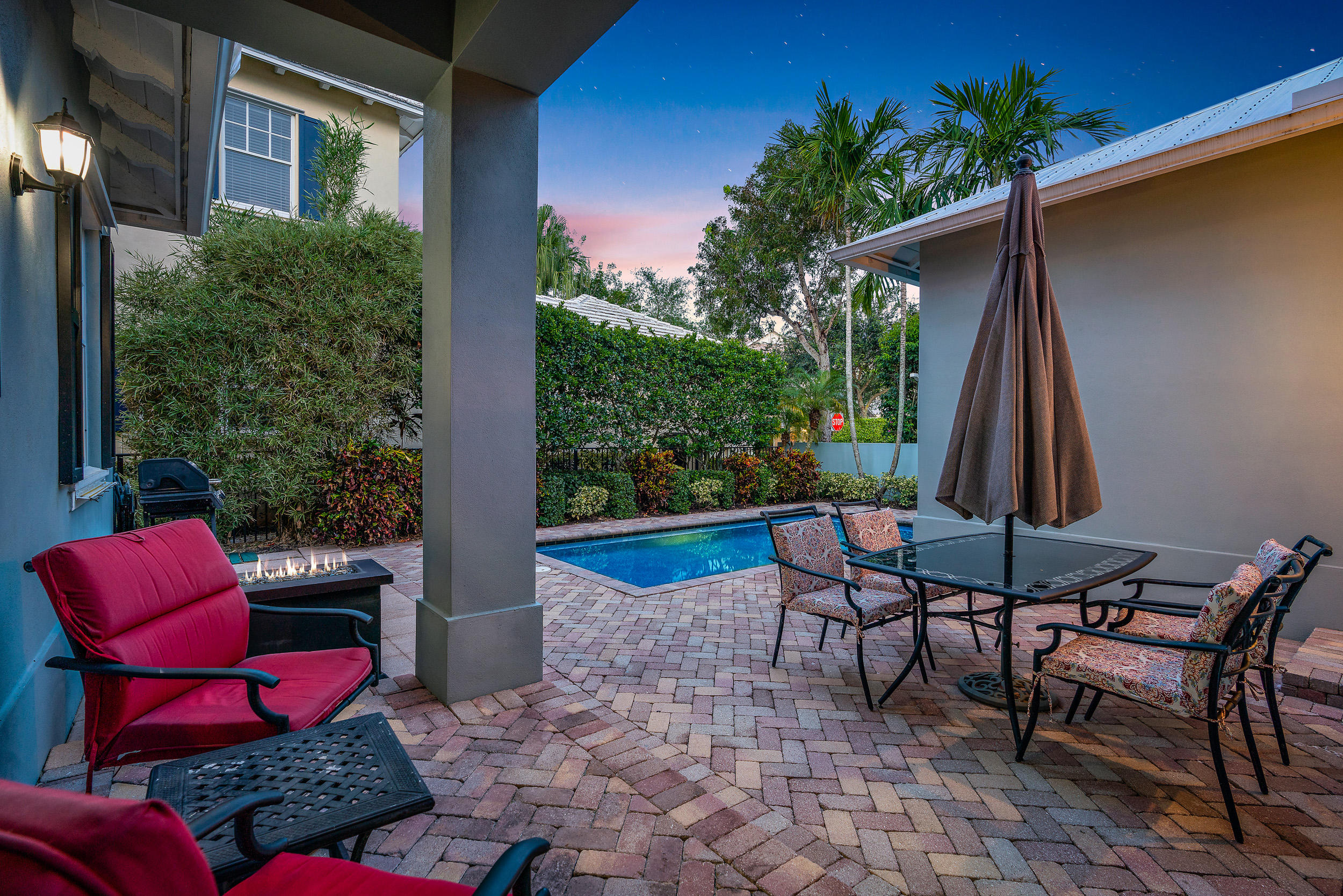 202 Botanica Drive Jupiter, FL 33458 - Photo 37 of 39 a view of a chairs and table in patio