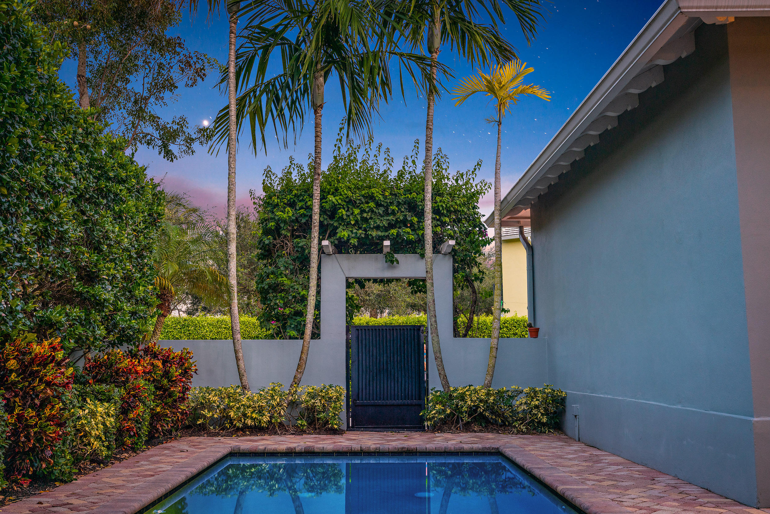 202 Botanica Drive Jupiter, FL 33458 - Photo 38 of 39 a view of a house with a small yard