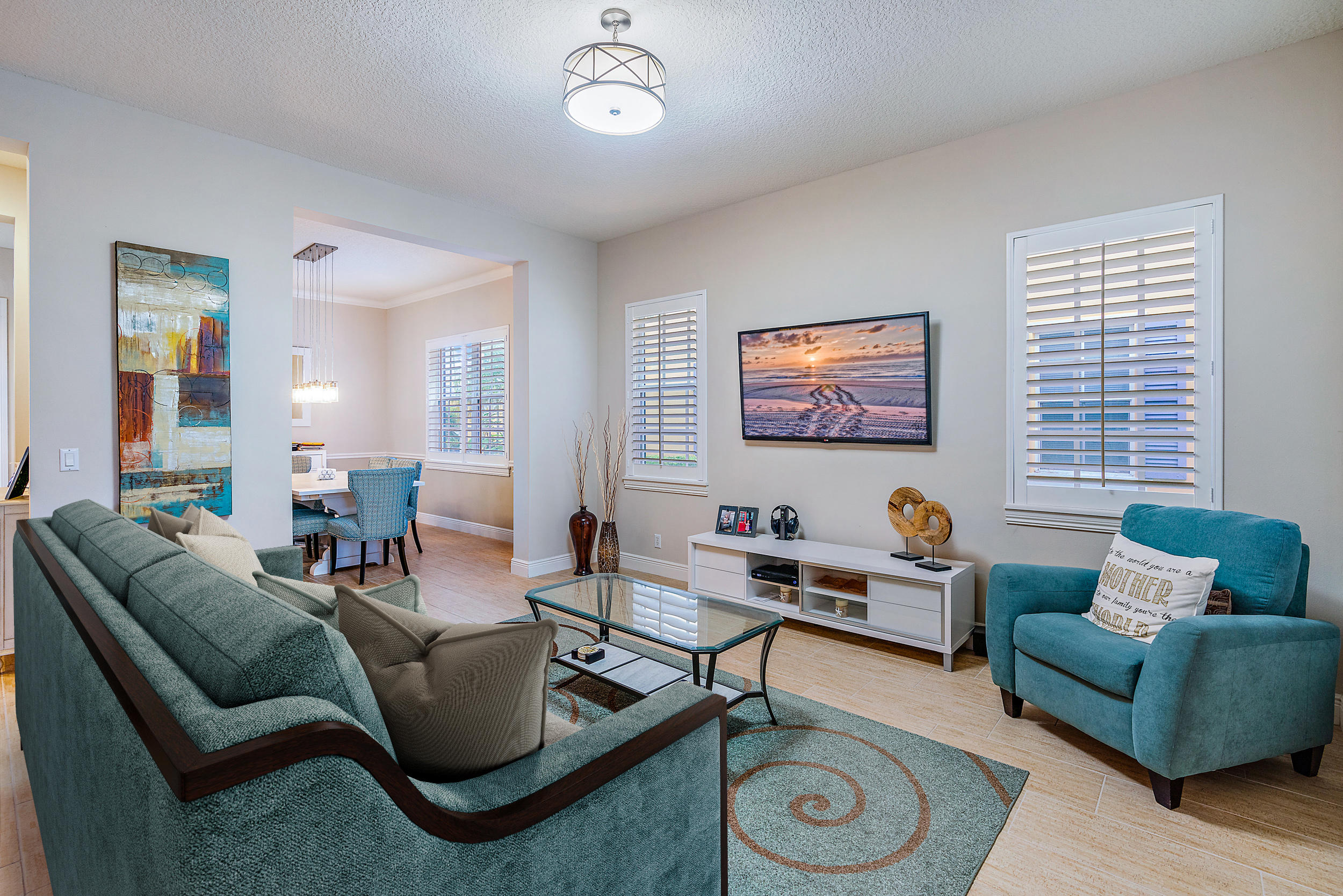202 Botanica Drive Jupiter, FL 33458 - Photo 10 of 39 a living room with furniture and a wooden floor