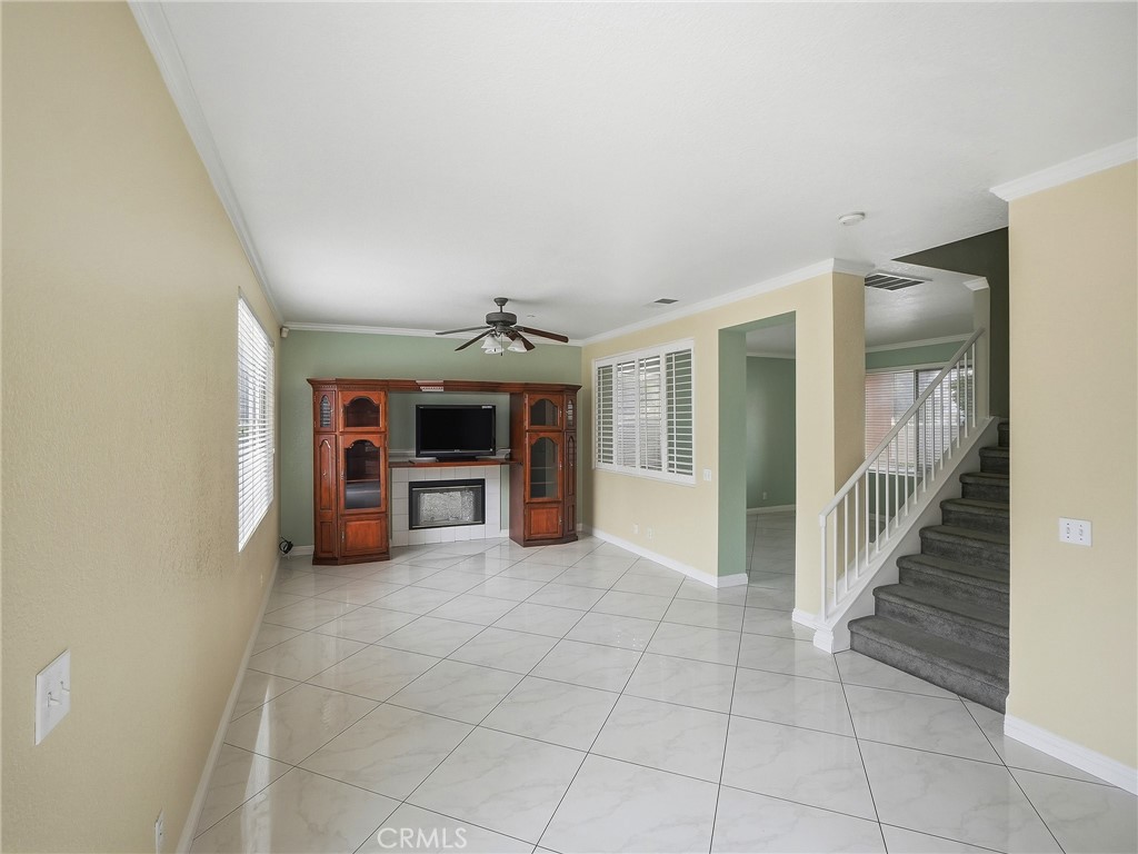15689 Swan Road Fontana, CA 92337 - Photo 11 of 35 family Room w/fireplace