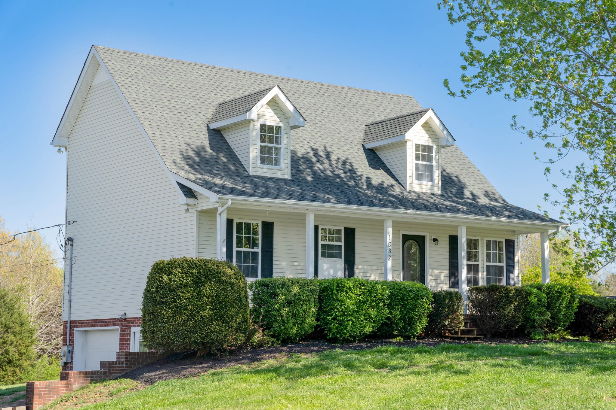 1032 Rock Church Road Dickson, TN 37055 - Photo 1 of 43 a front view of a house with yard and green space