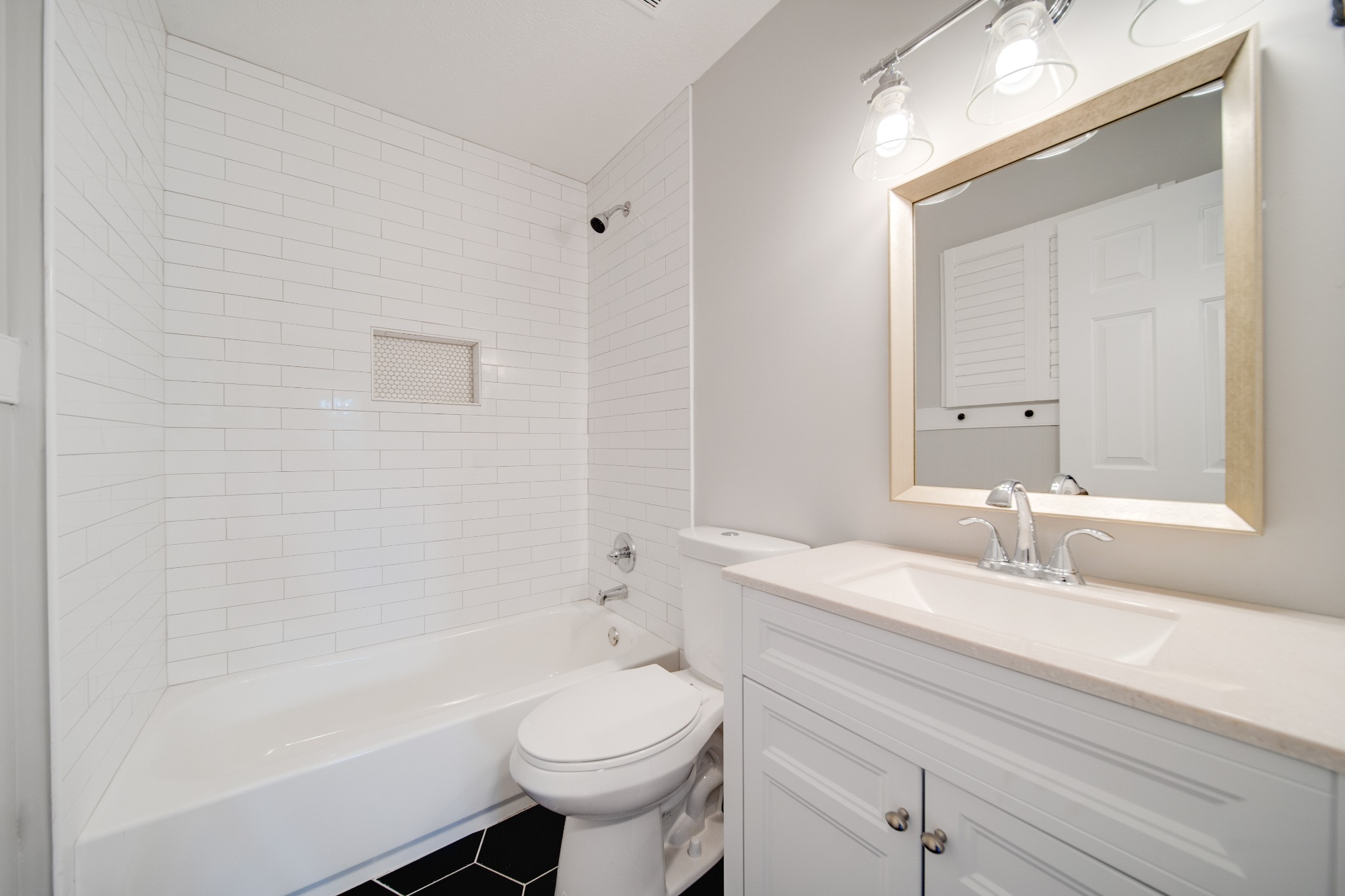 1032 Rock Church Road Dickson, TN 37055 - Photo 29 of 43 a bathroom with a sink a toilet and shower