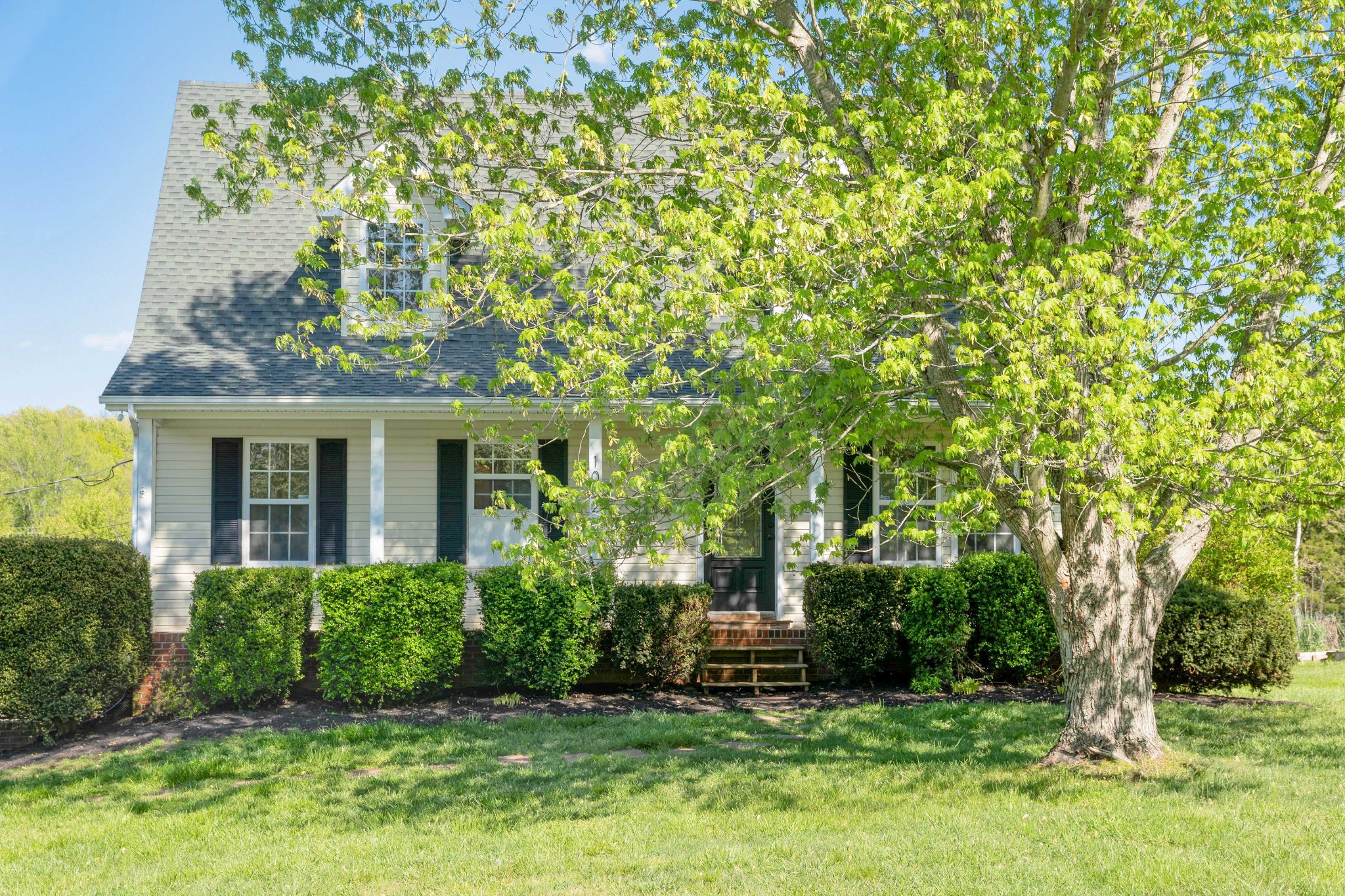 1032 Rock Church Road Dickson, TN 37055 - Photo 3 of 43 a view of a house with a tree in a yard