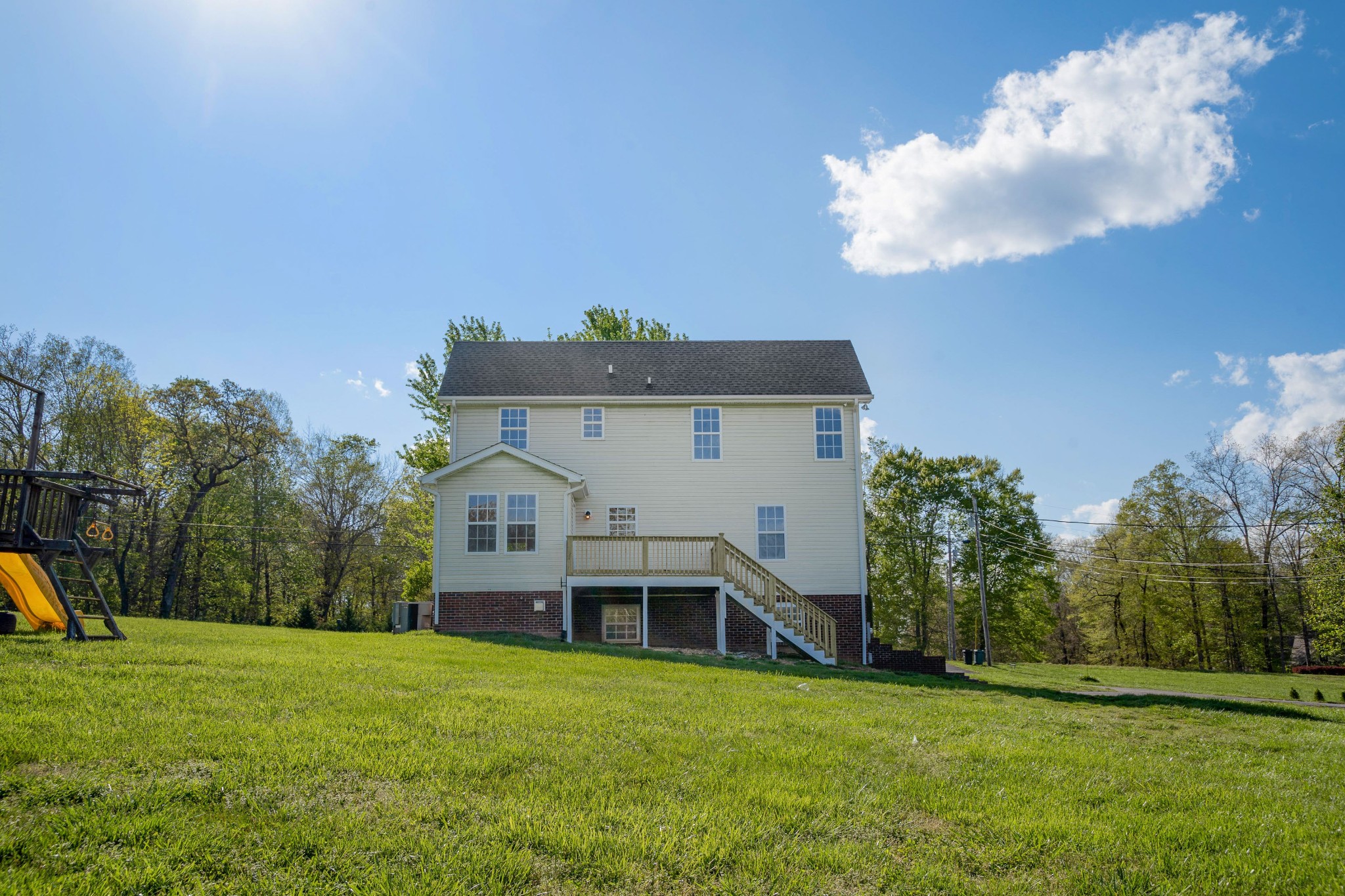 1032 Rock Church Road Dickson, TN 37055 - Photo 38 of 43 a front view of a house with a garden