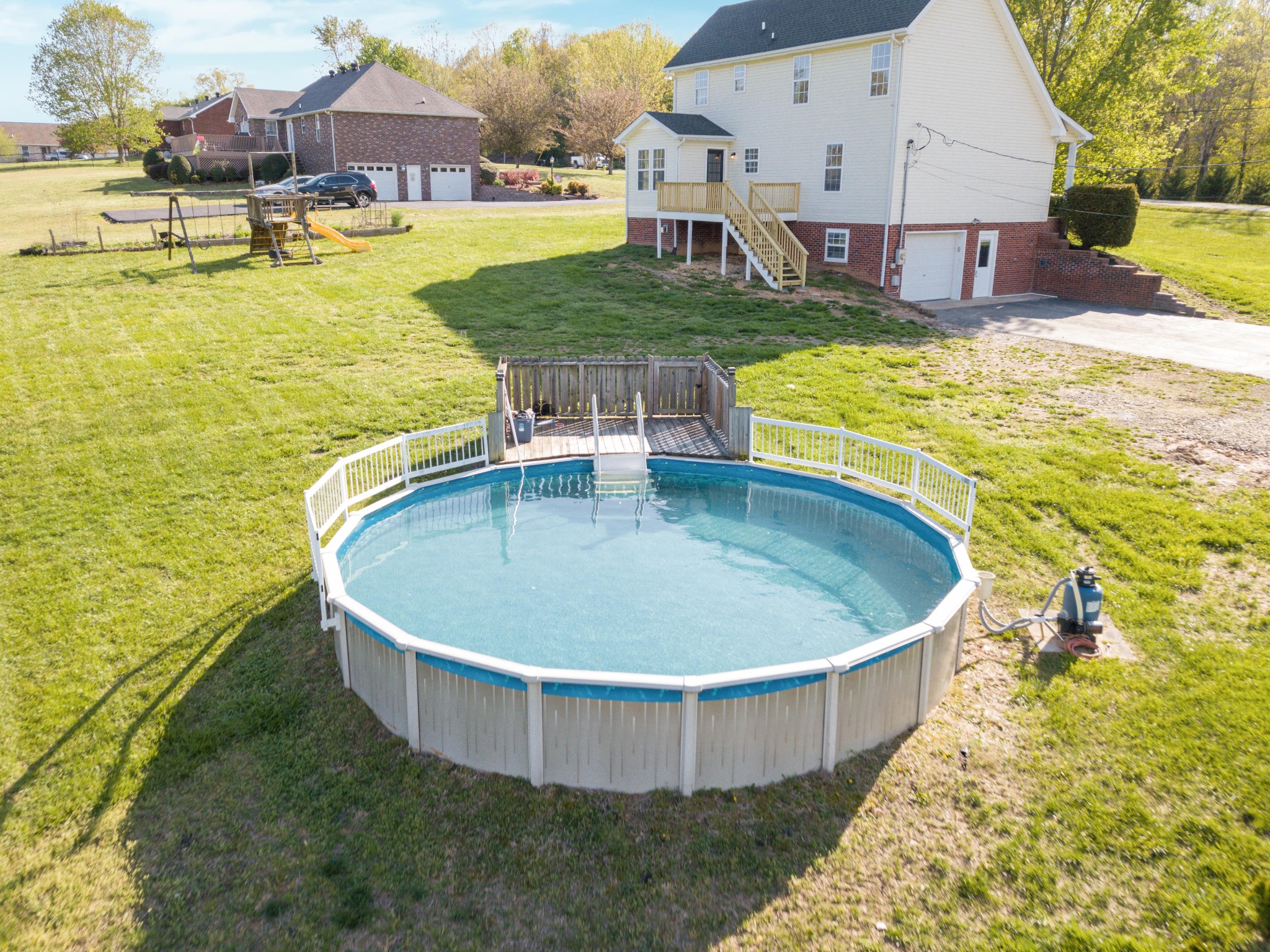 1032 Rock Church Road Dickson, TN 37055 - Photo 40 of 43 a view of a swimming pool with a yard