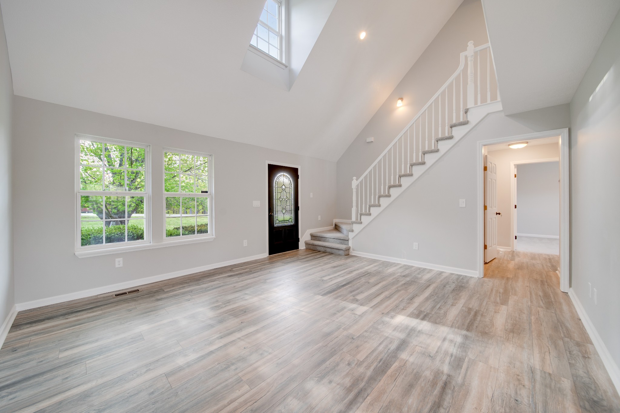 1032 Rock Church Road Dickson, TN 37055 - Photo 4 of 43 wooden floor in an empty room with a window
