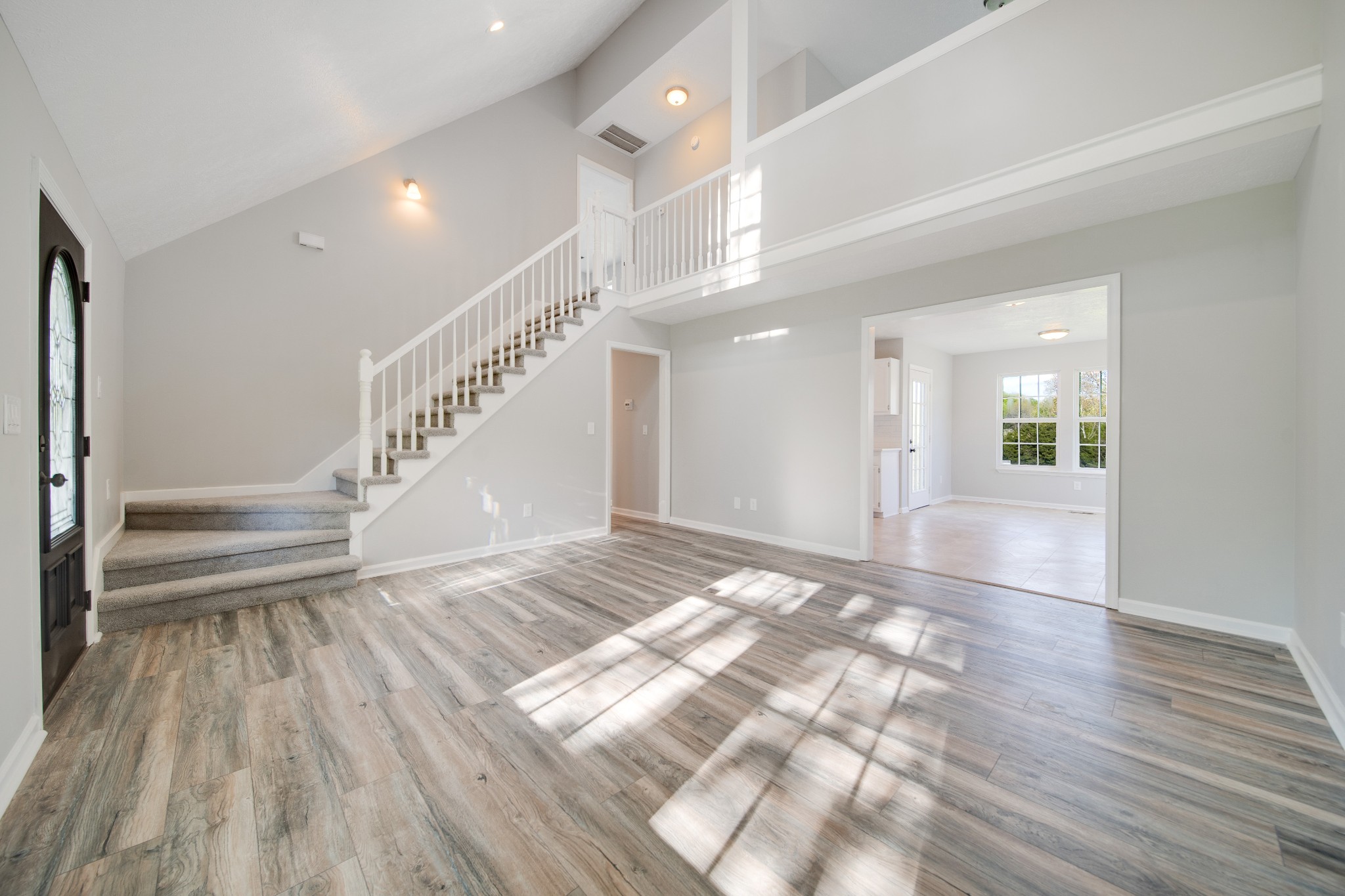1032 Rock Church Road Dickson, TN 37055 - Photo 7 of 43 a view of an empty room and wooden floor