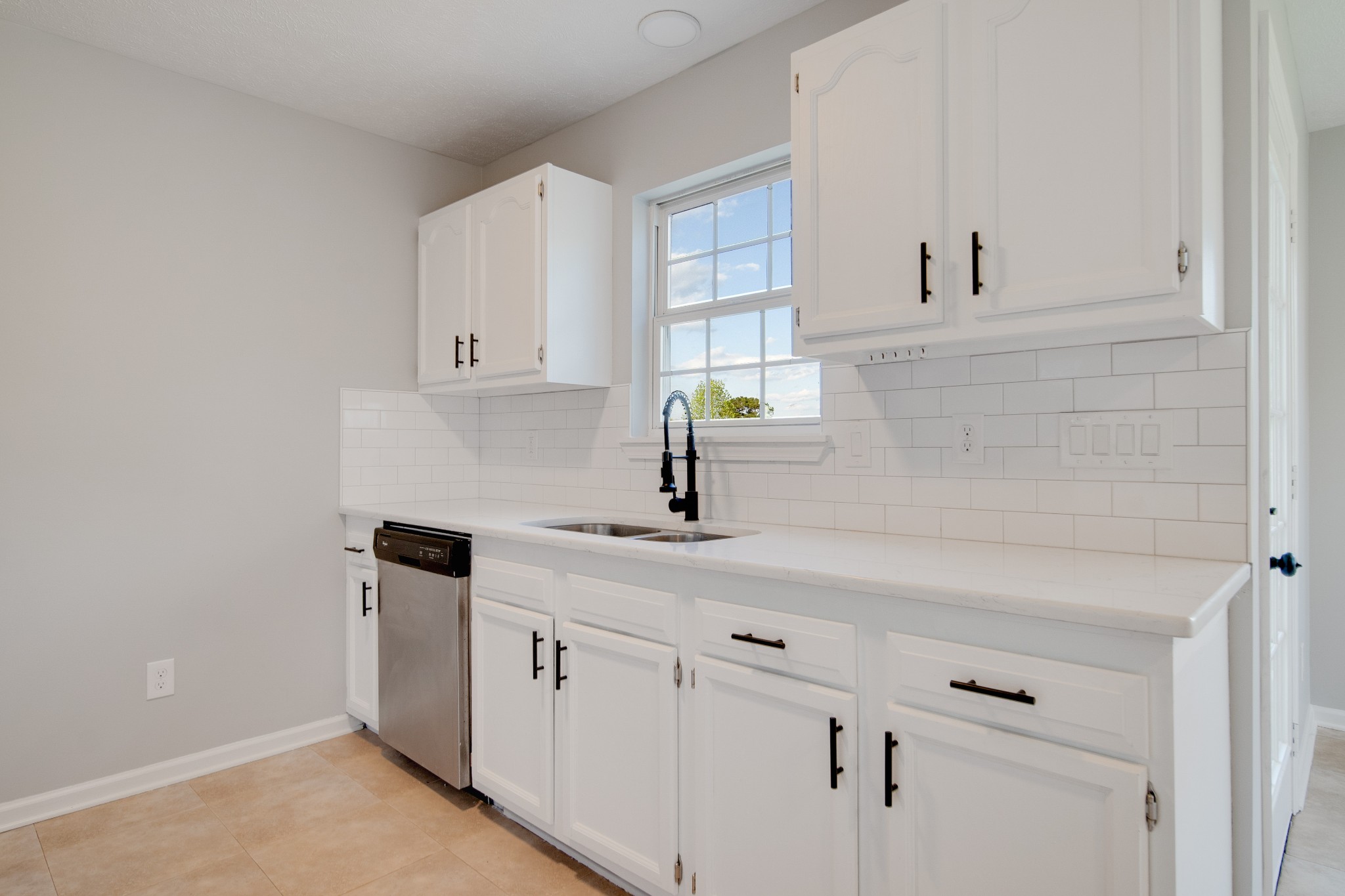 1032 Rock Church Road Dickson, TN 37055 - Photo 10 of 43 a kitchen with white cabinets