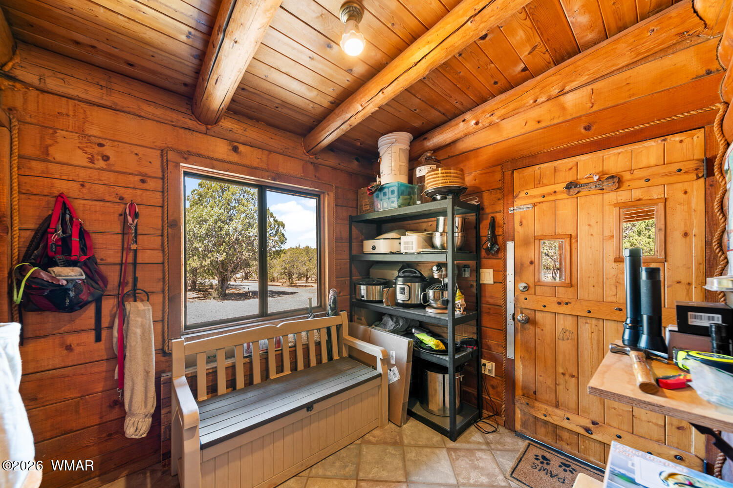 6720 Cheney Ranch Loop Show Low, AZ 85901 - Photo 15 of 55 a view of a porch with furniture and a window