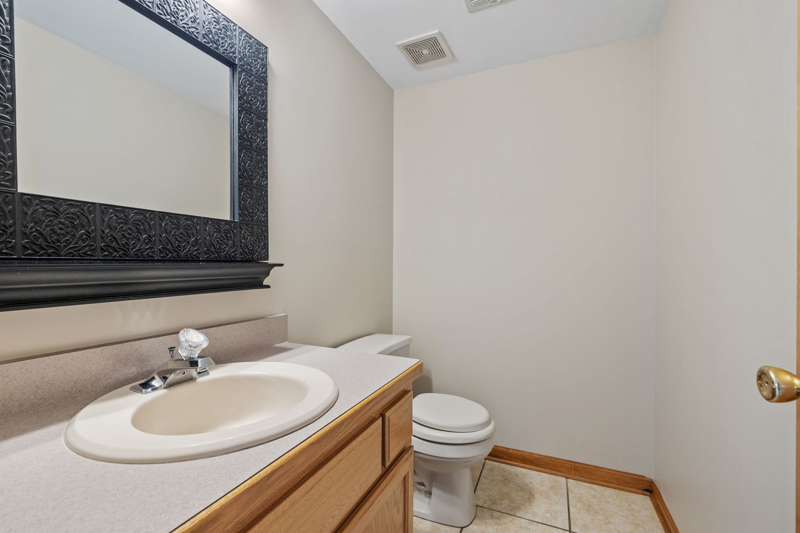 2714 Billie Limacher Lane Plainfield, IL 60586 - Photo 12 of 26 a bathroom with a sink and a mirror