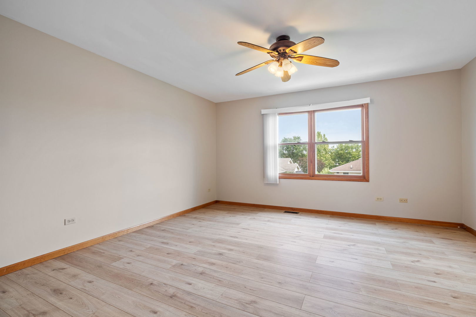 2714 Billie Limacher Lane Plainfield, IL 60586 - Photo 14 of 26 an empty room with wooden floor and windows