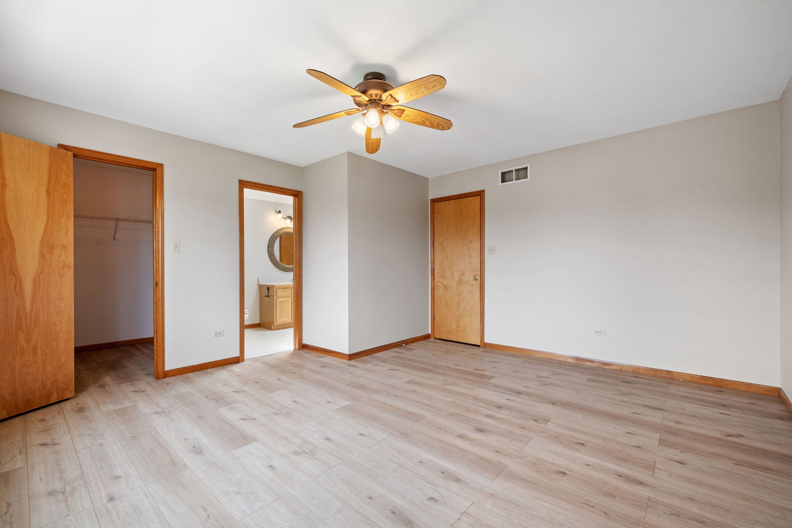 2714 Billie Limacher Lane Plainfield, IL 60586 - Photo 16 of 26 a view of an empty room with window and wooden floor