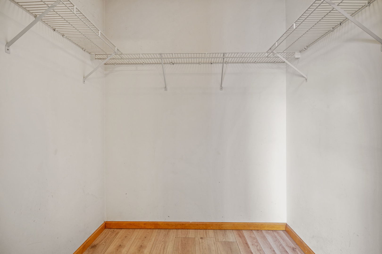 2714 Billie Limacher Lane Plainfield, IL 60586 - Photo 17 of 26 a view of a room with racks on the wall