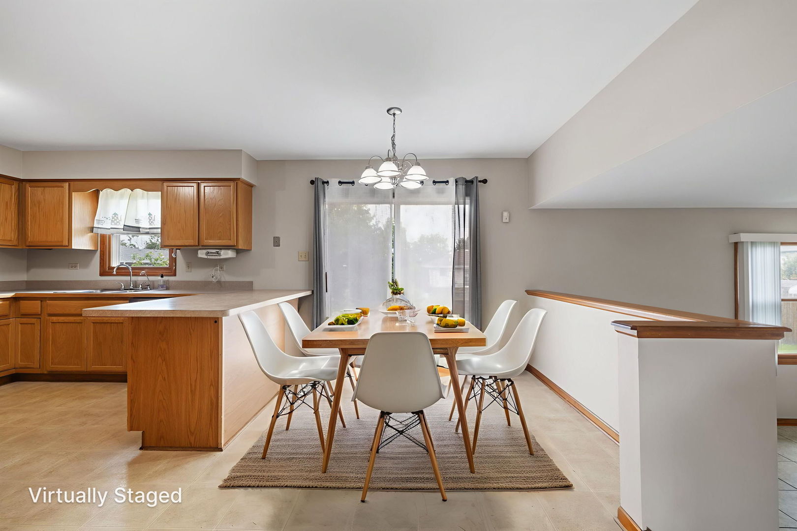 2714 Billie Limacher Lane Plainfield, IL 60586 - Photo 4 of 26 a view of a dining room with furniture and window