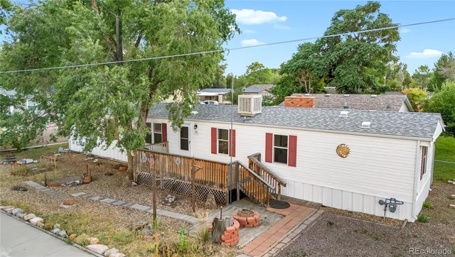a view of a house with a small park