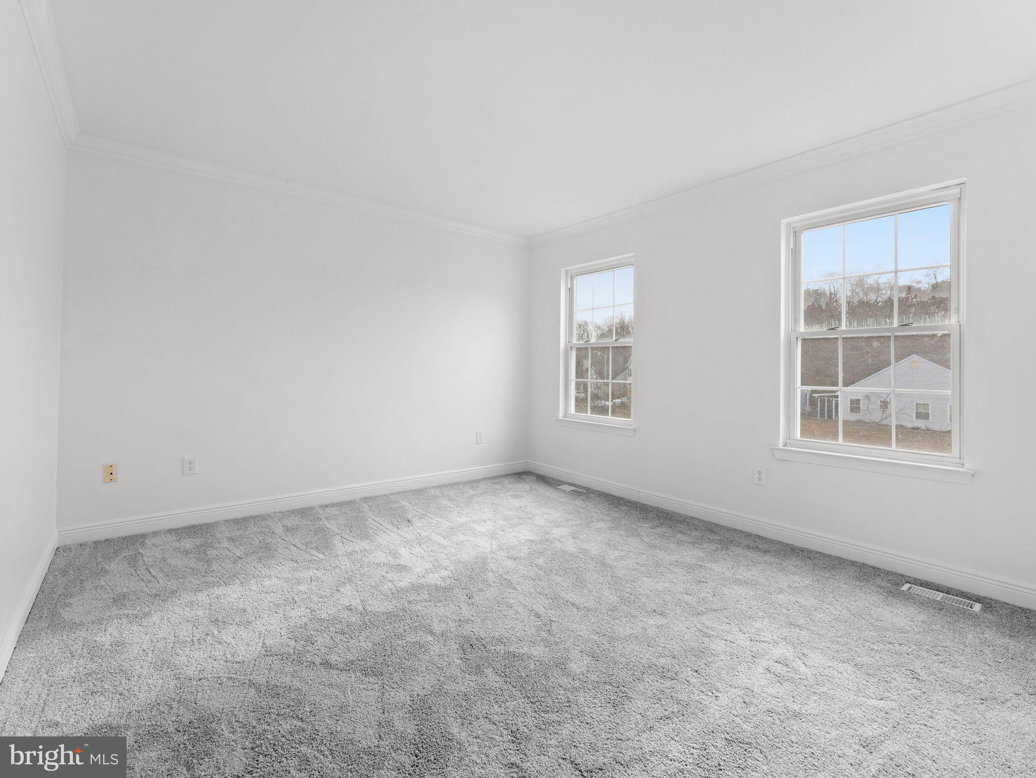 617 Caribbean Way Williamstown, NJ 08094 - Photo 18 of 26 an empty room with windows