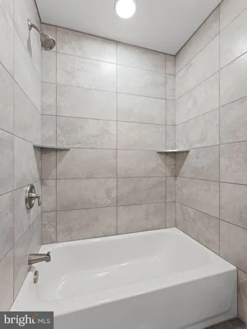 a bathroom with a bathtub