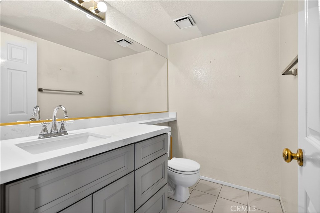 6727 Hawkley Drive Riverside, CA 92506 - Photo 19 of 52 Downstairs bathroom.