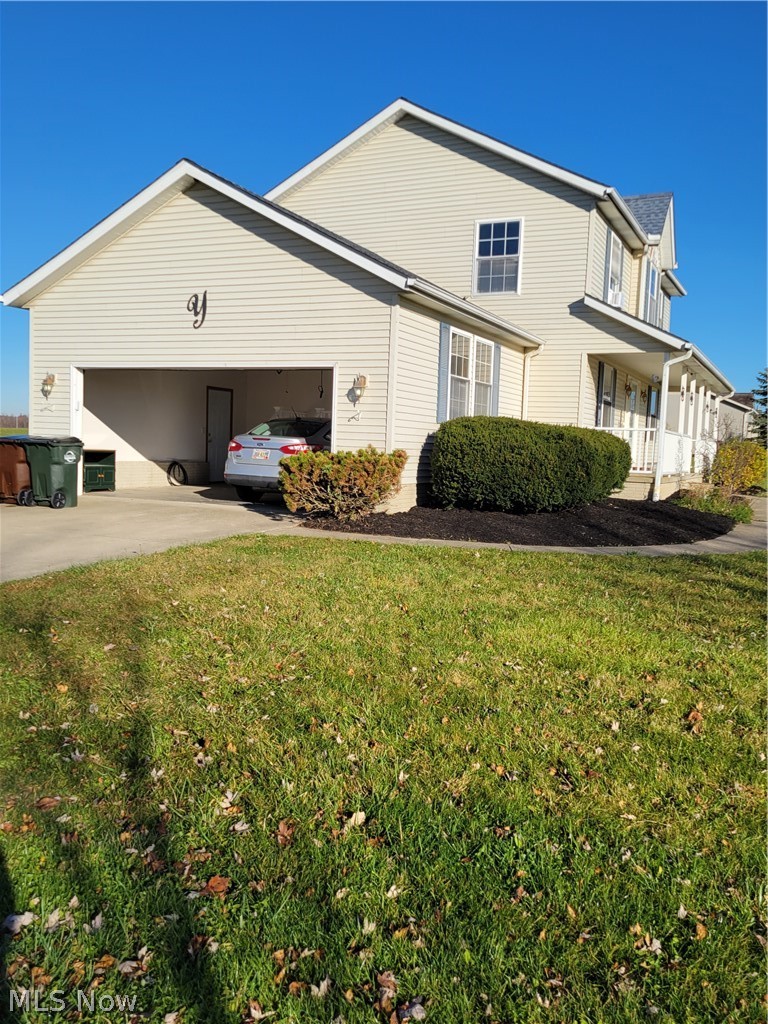 17276 Quarry Road Wellington, OH 44090 - Photo 31 of 35 Side view of the home