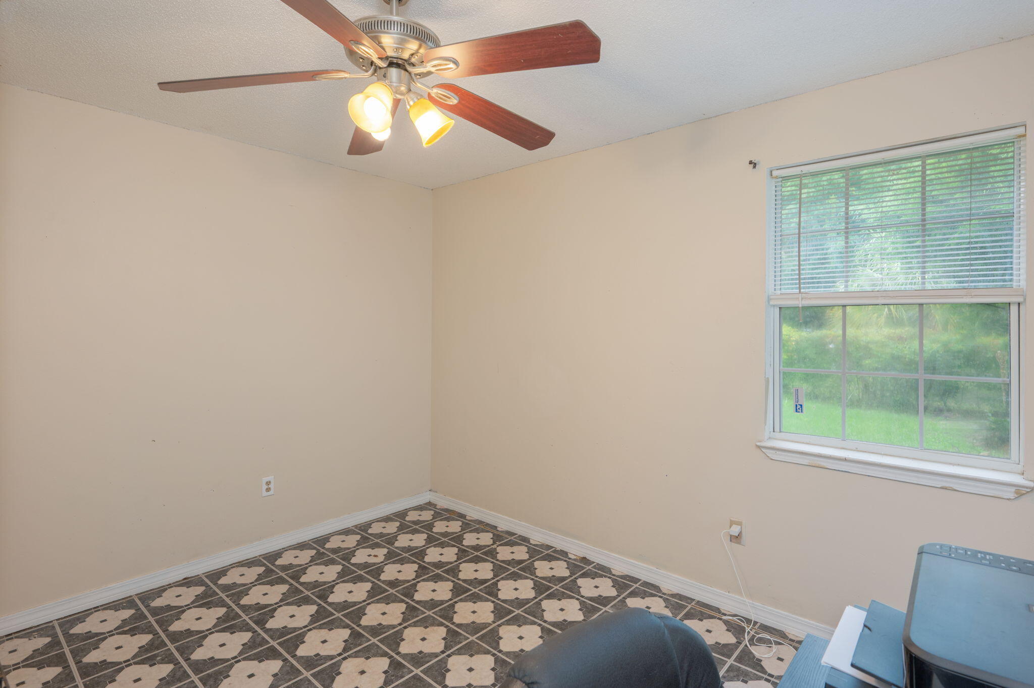 834 McDonald Street Crestview, FL 32536 - Photo 21 of 35 an empty room with a window
