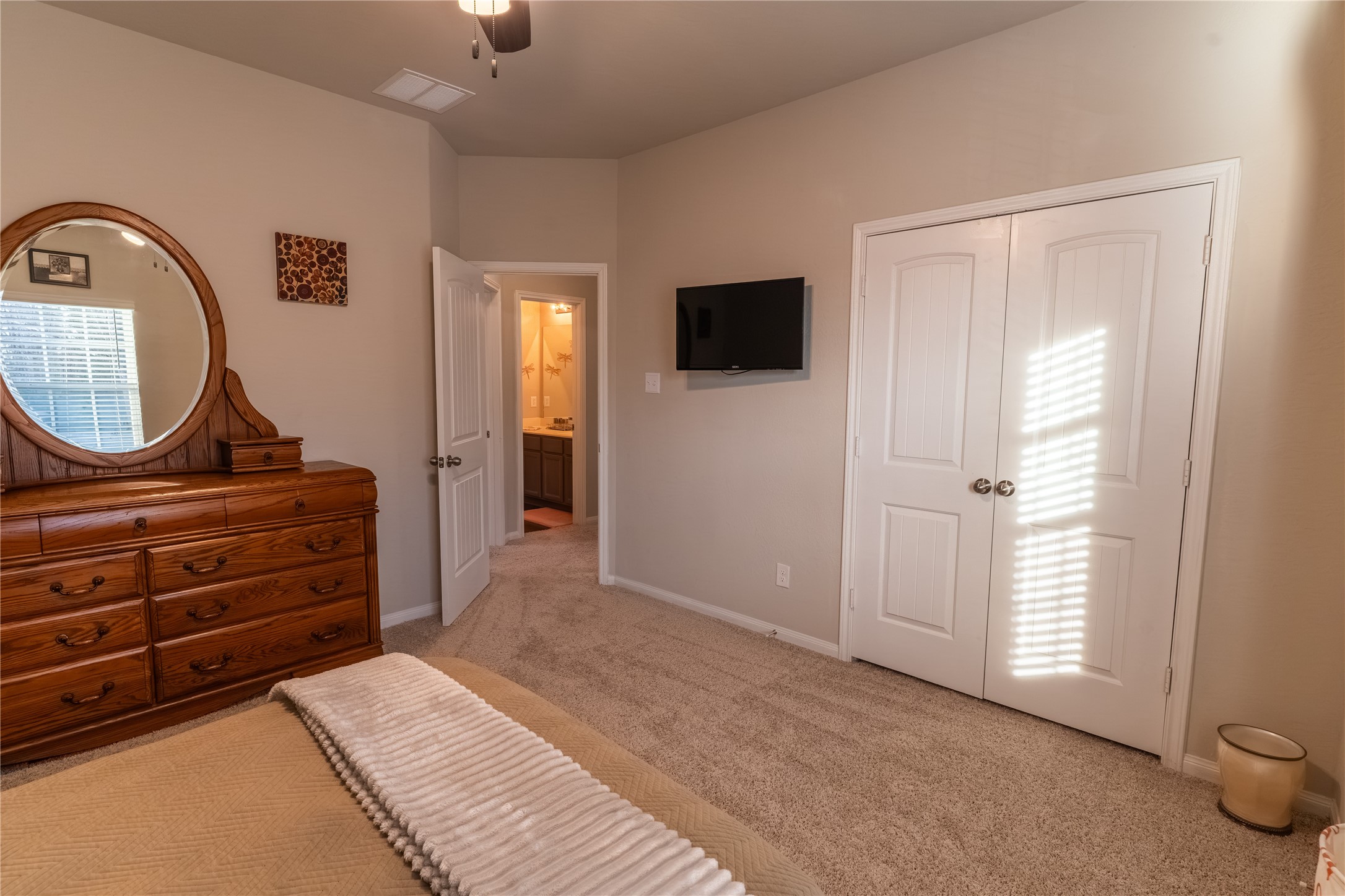 2512 Austin Hills Conroe, TX 77304 - Photo 28 of 43 a room with a bed and a television