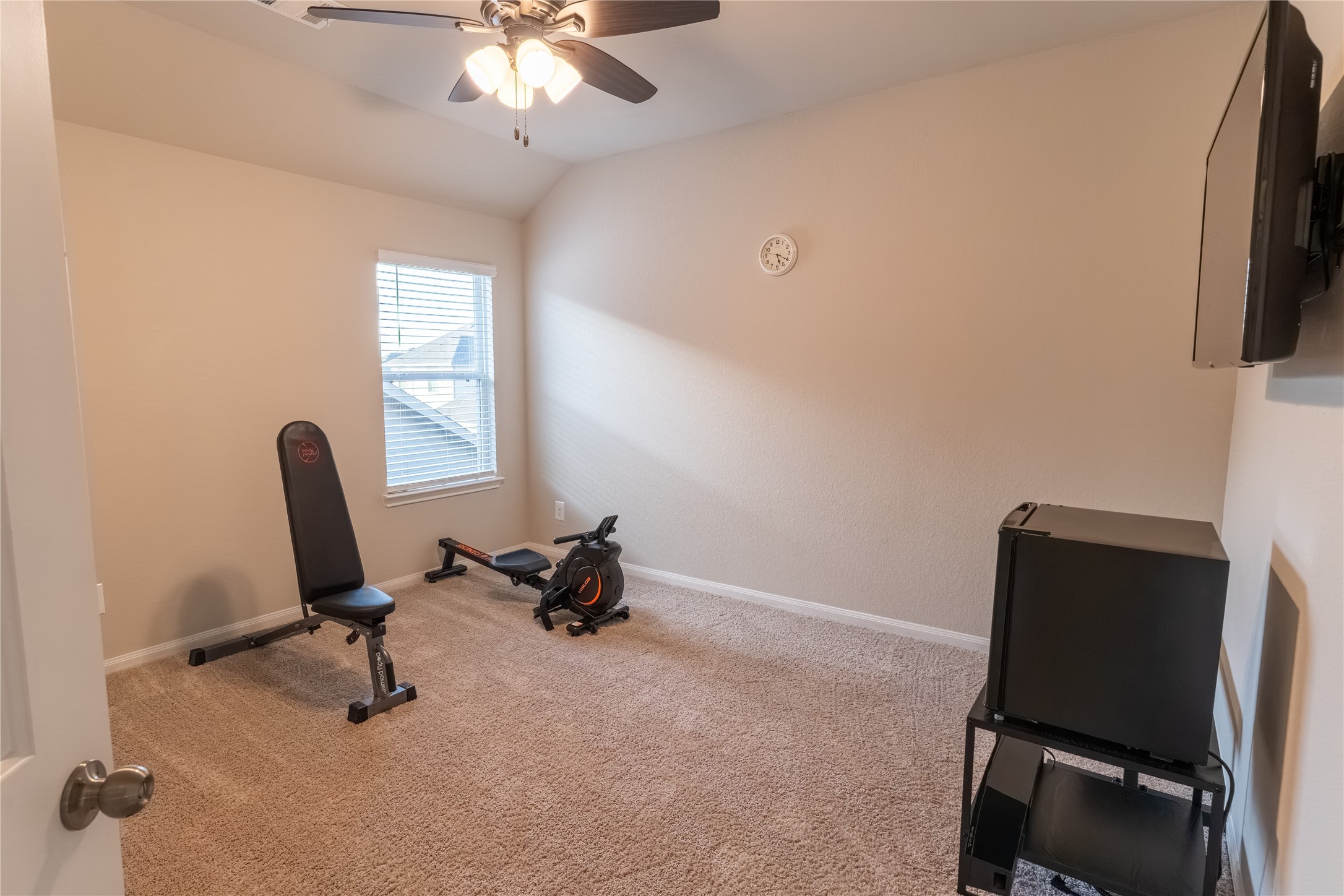 2512 Austin Hills Conroe, TX 77304 - Photo 29 of 43 a view of a workspace with furniture and a window