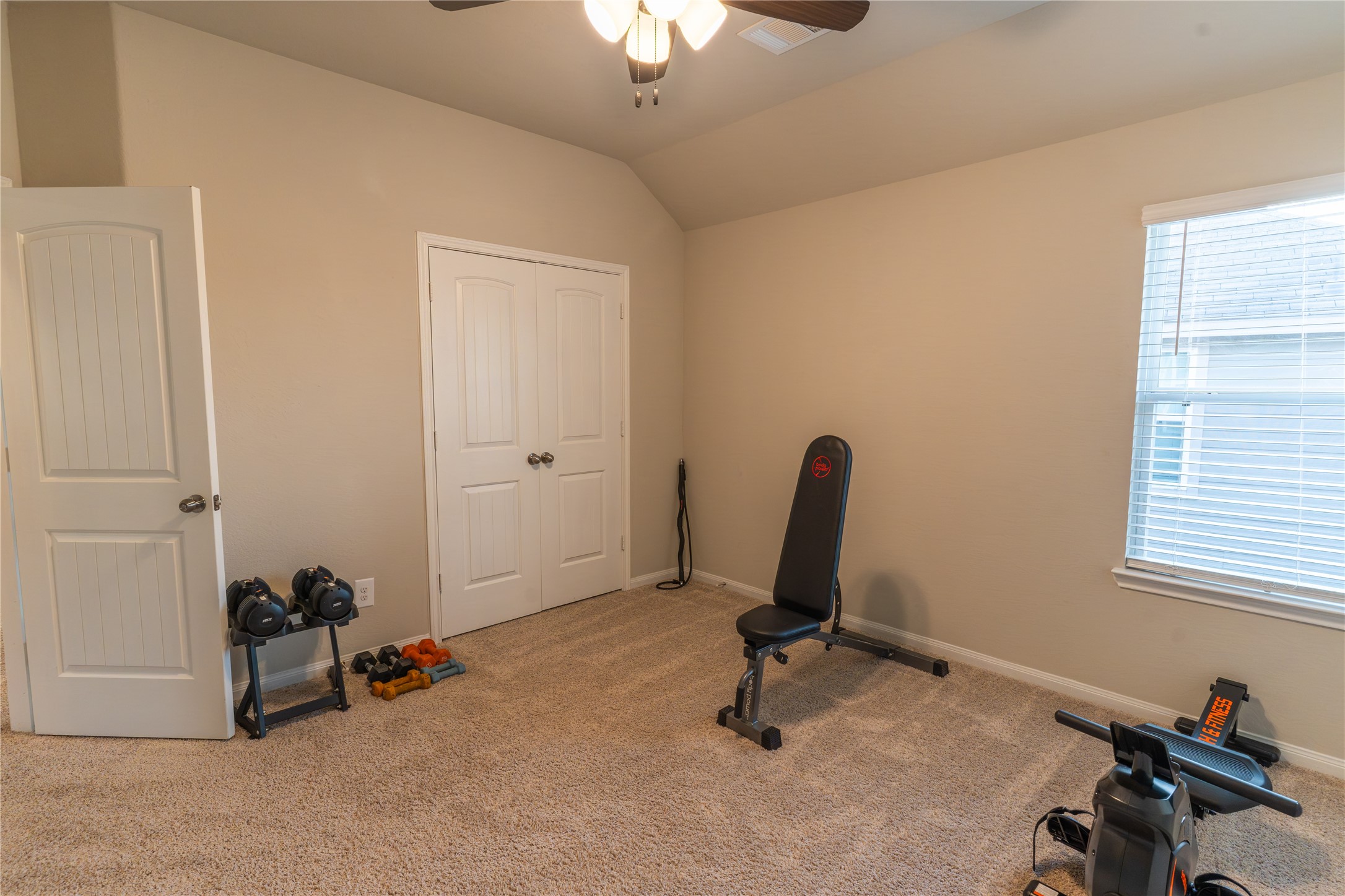2512 Austin Hills Conroe, TX 77304 - Photo 30 of 43 a view of a workspace with furniture and a window