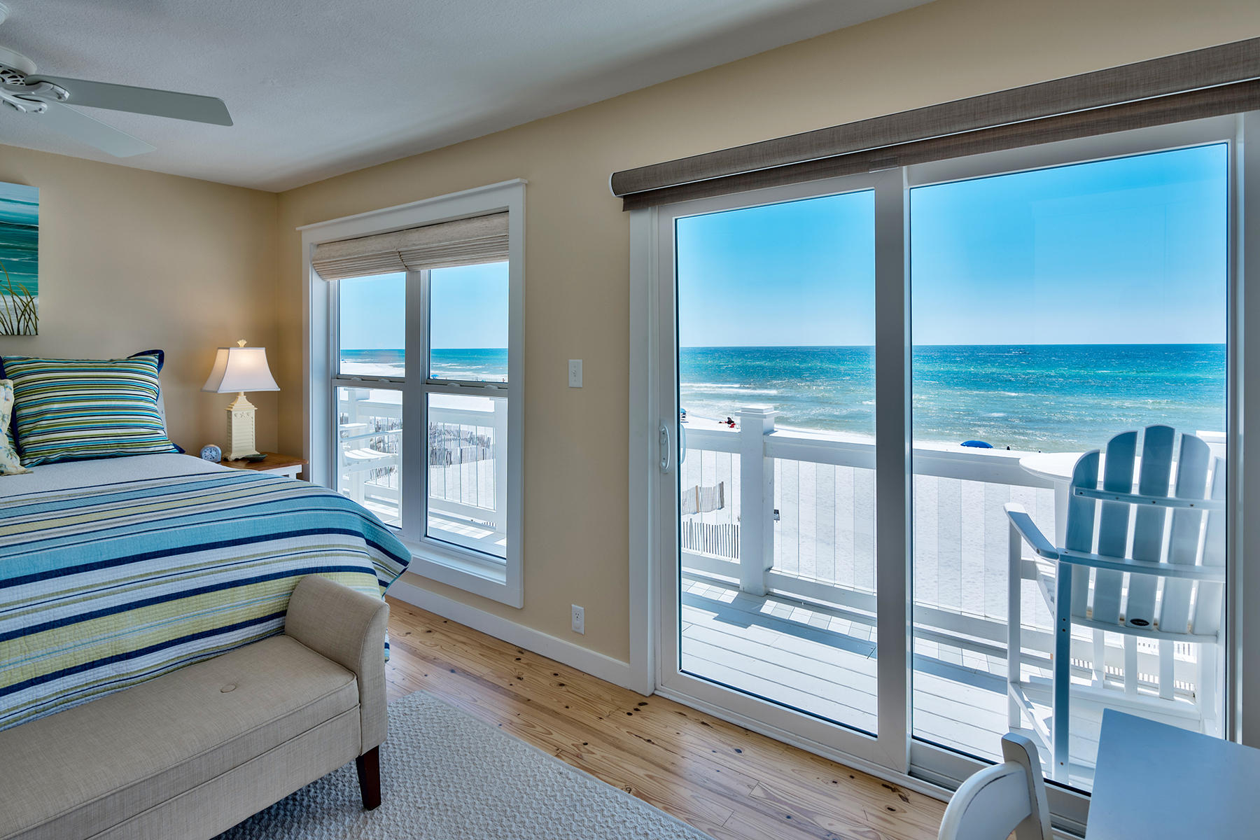 637 Eastern Lake Road Santa Rosa Beach, FL 32459 - Photo 11 of 25 a bedroom with furniture and large window