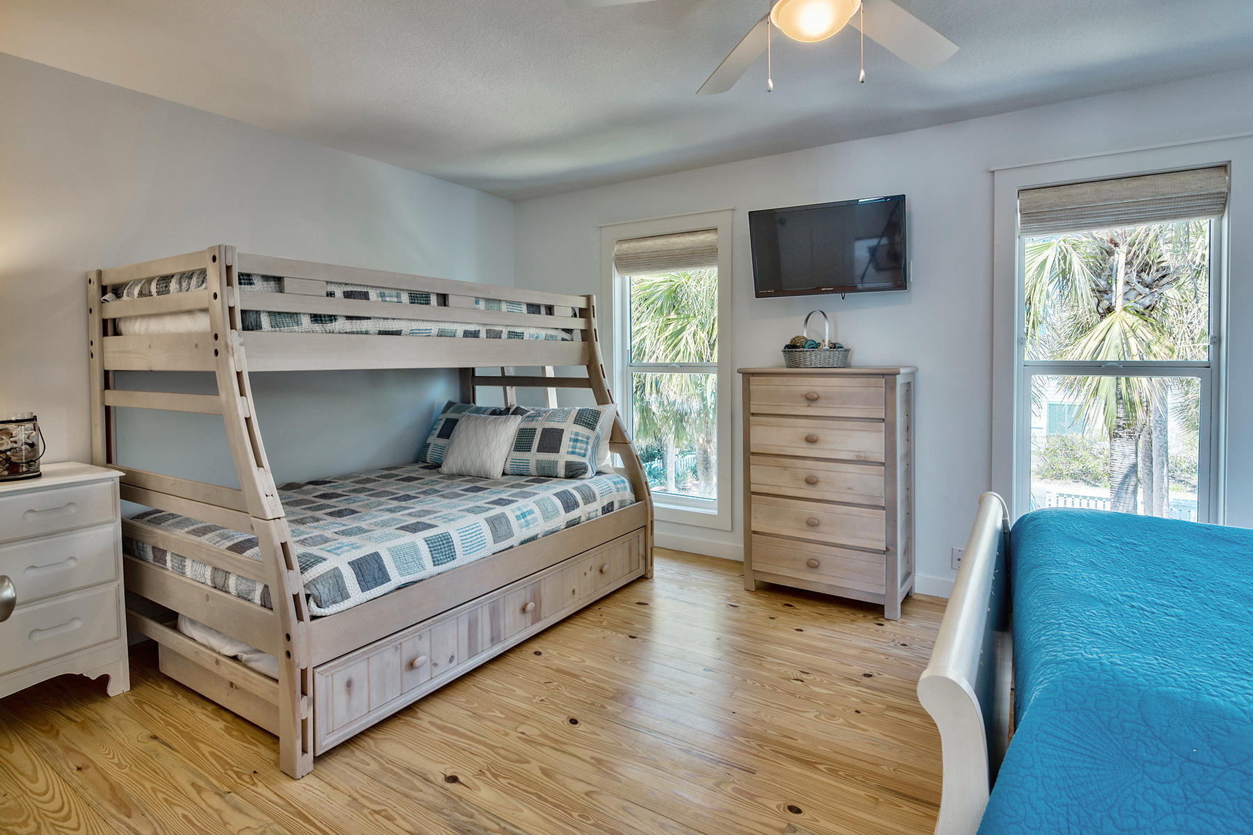637 Eastern Lake Road Santa Rosa Beach, FL 32459 - Photo 19 of 25 a bedroom with a bed and flat screen tv