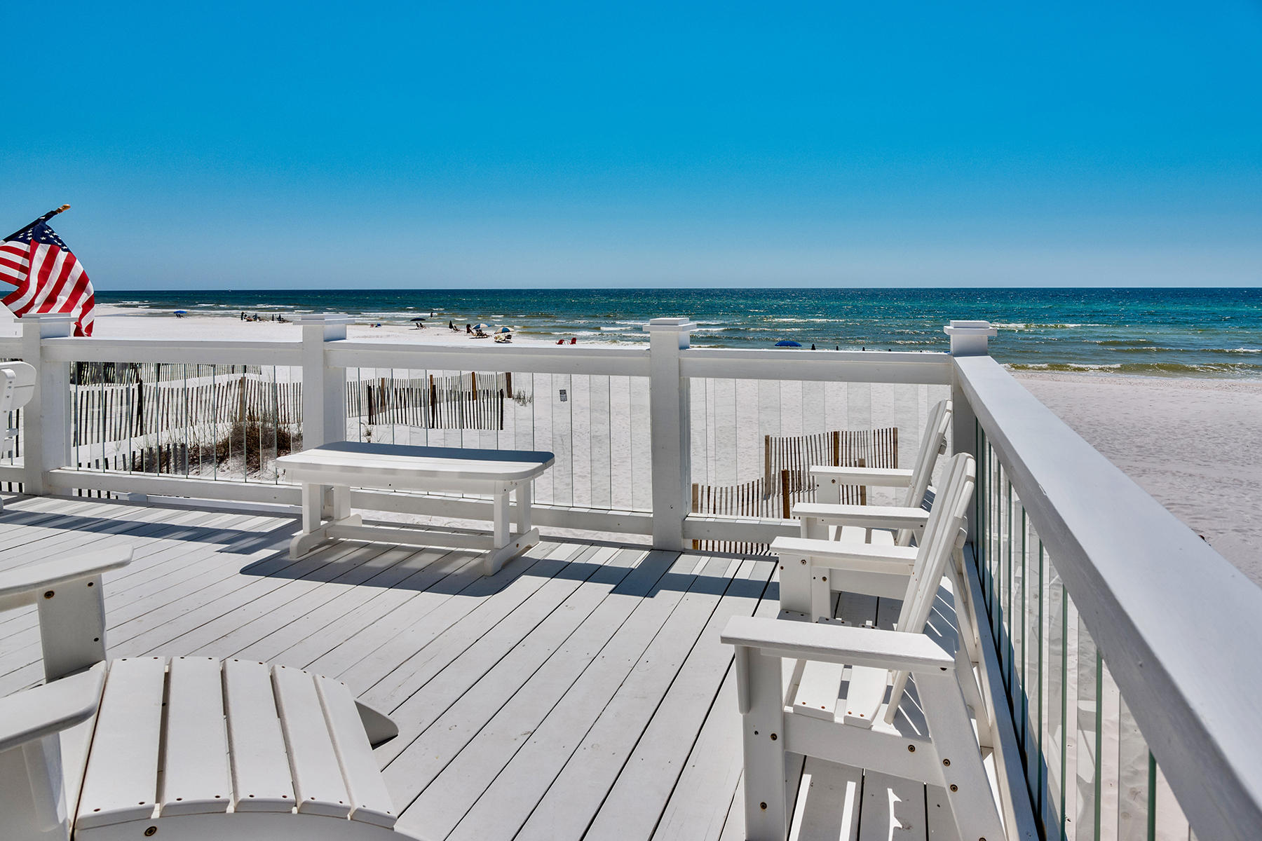 637 Eastern Lake Road Santa Rosa Beach, FL 32459 - Photo 22 of 25 a view of a balcony with wooden floor and outdoor seating