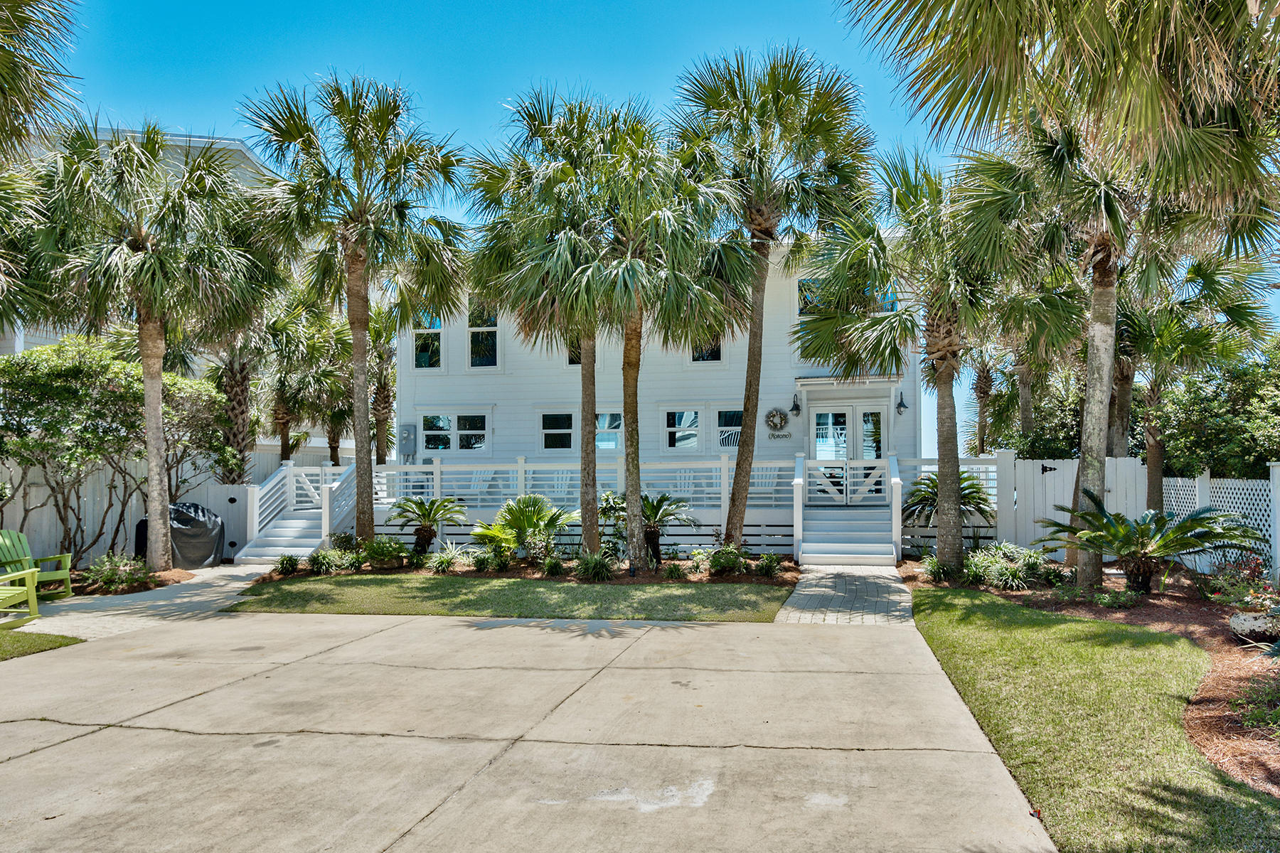 637 Eastern Lake Road Santa Rosa Beach, FL 32459 - Photo 23 of 25 a front view of a house with a yard