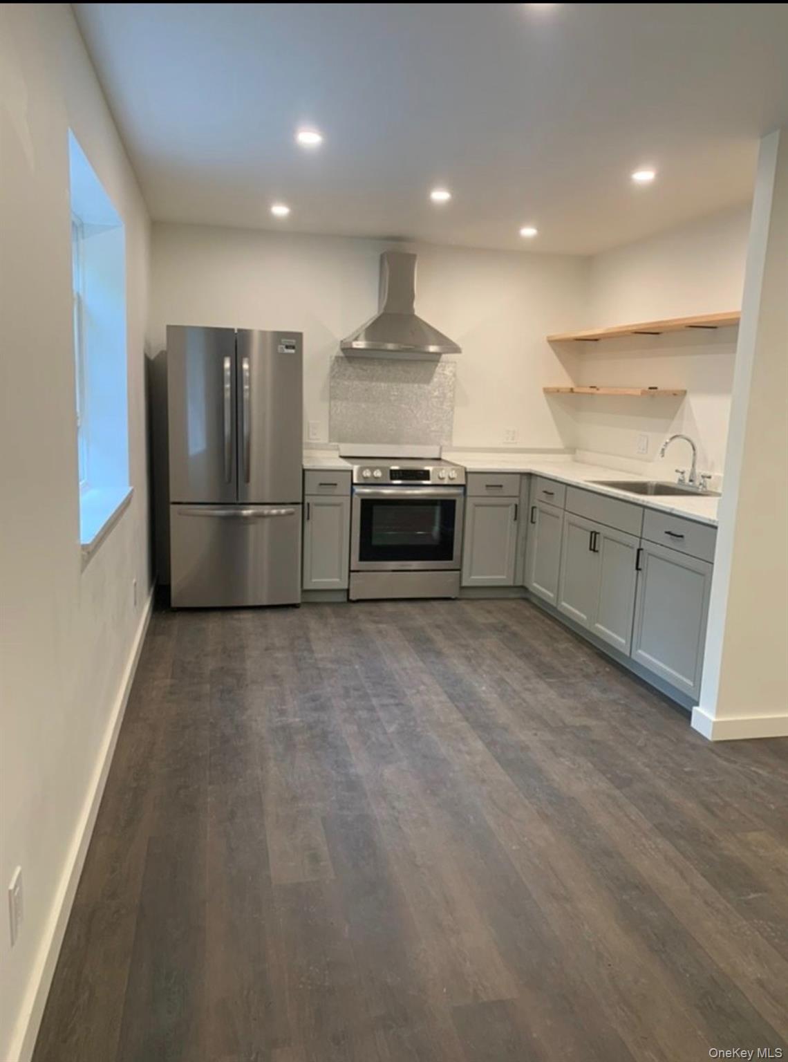 35 Old Rte 199 Red Hook, NY 12571 - Photo 2 of 10 a large kitchen with stainless steel appliances granite countertop a stove and a refrigerator