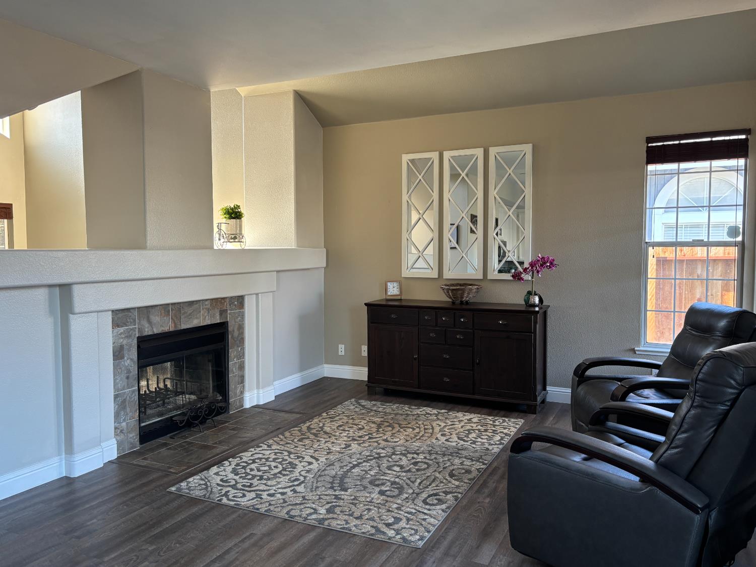 4909 Hidden Meadow Way Antelope, CA 95843 - Photo 14 of 35 a living room with furniture and a fireplace