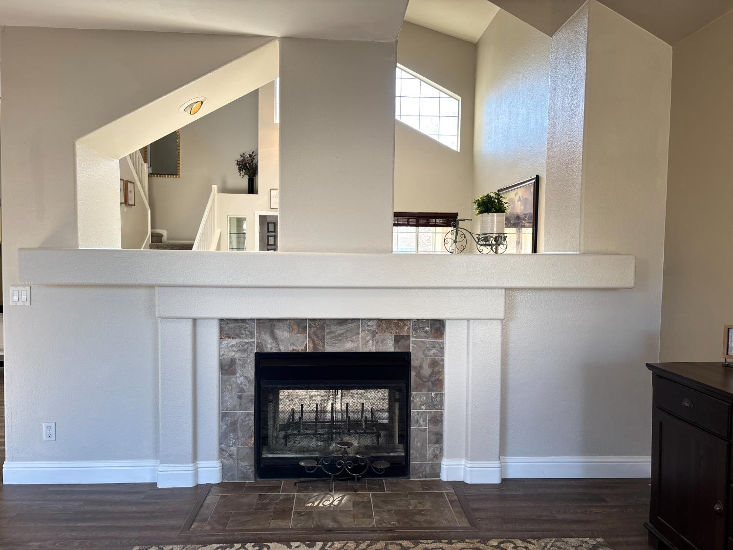 4909 Hidden Meadow Way Antelope, CA 95843 - Photo 15 of 35 a living room with furniture and a fireplace