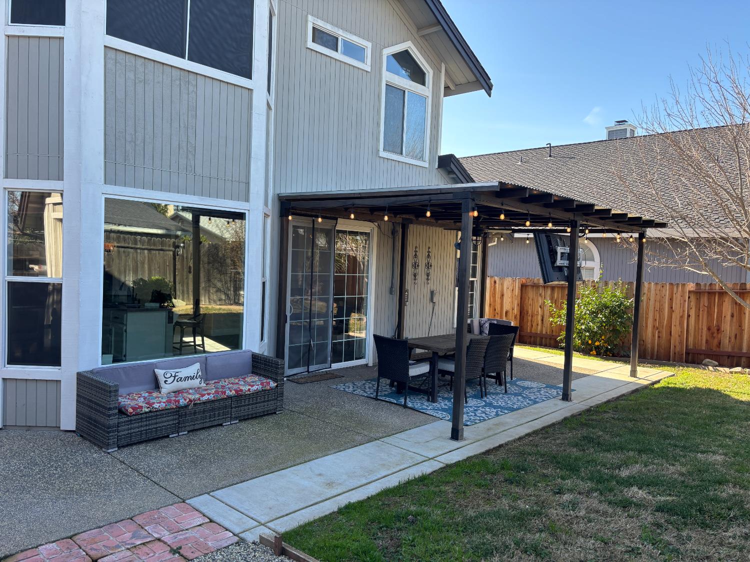 4909 Hidden Meadow Way Antelope, CA 95843 - Photo 33 of 35 a view of a house with backyard porch and sitting area