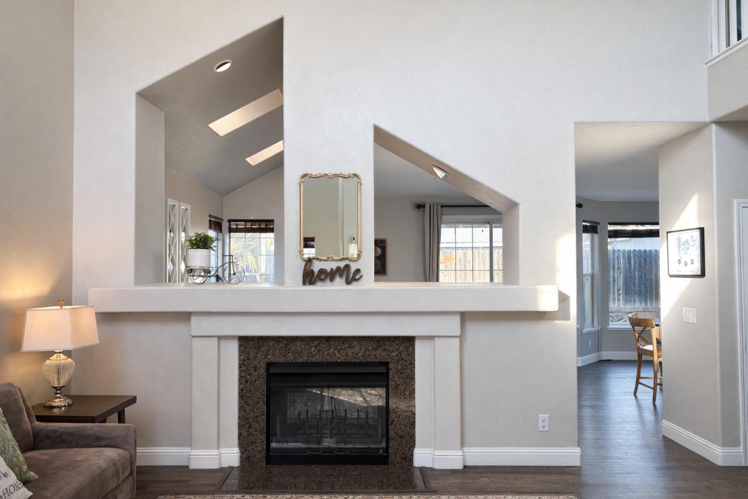 4909 Hidden Meadow Way Antelope, CA 95843 - Photo 6 of 35 a living room with furniture and a fireplace