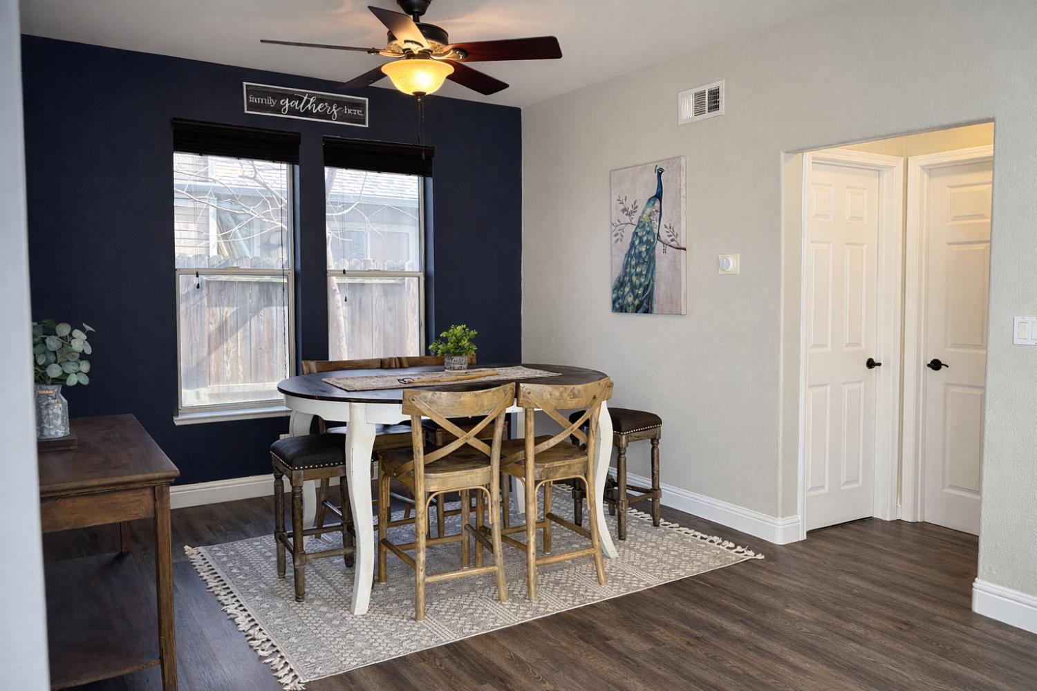 4909 Hidden Meadow Way Antelope, CA 95843 - Photo 8 of 35 a view of a dining room with furniture window and wooden floor