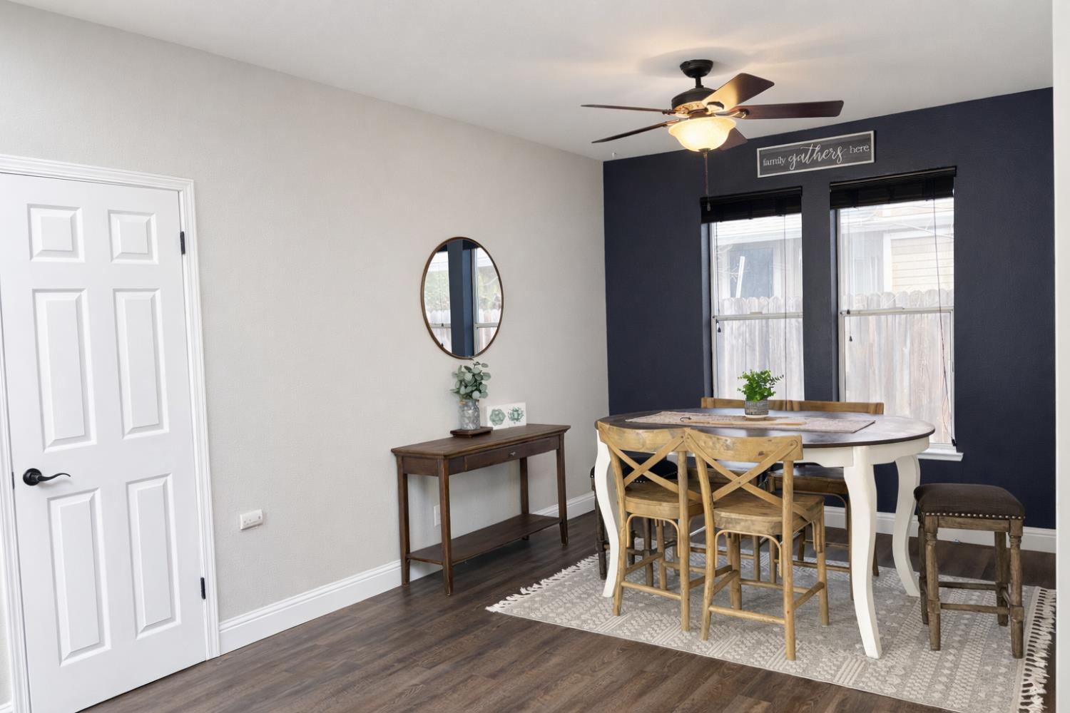 4909 Hidden Meadow Way Antelope, CA 95843 - Photo 9 of 35 a view of a dining room with furniture window and wooden floor