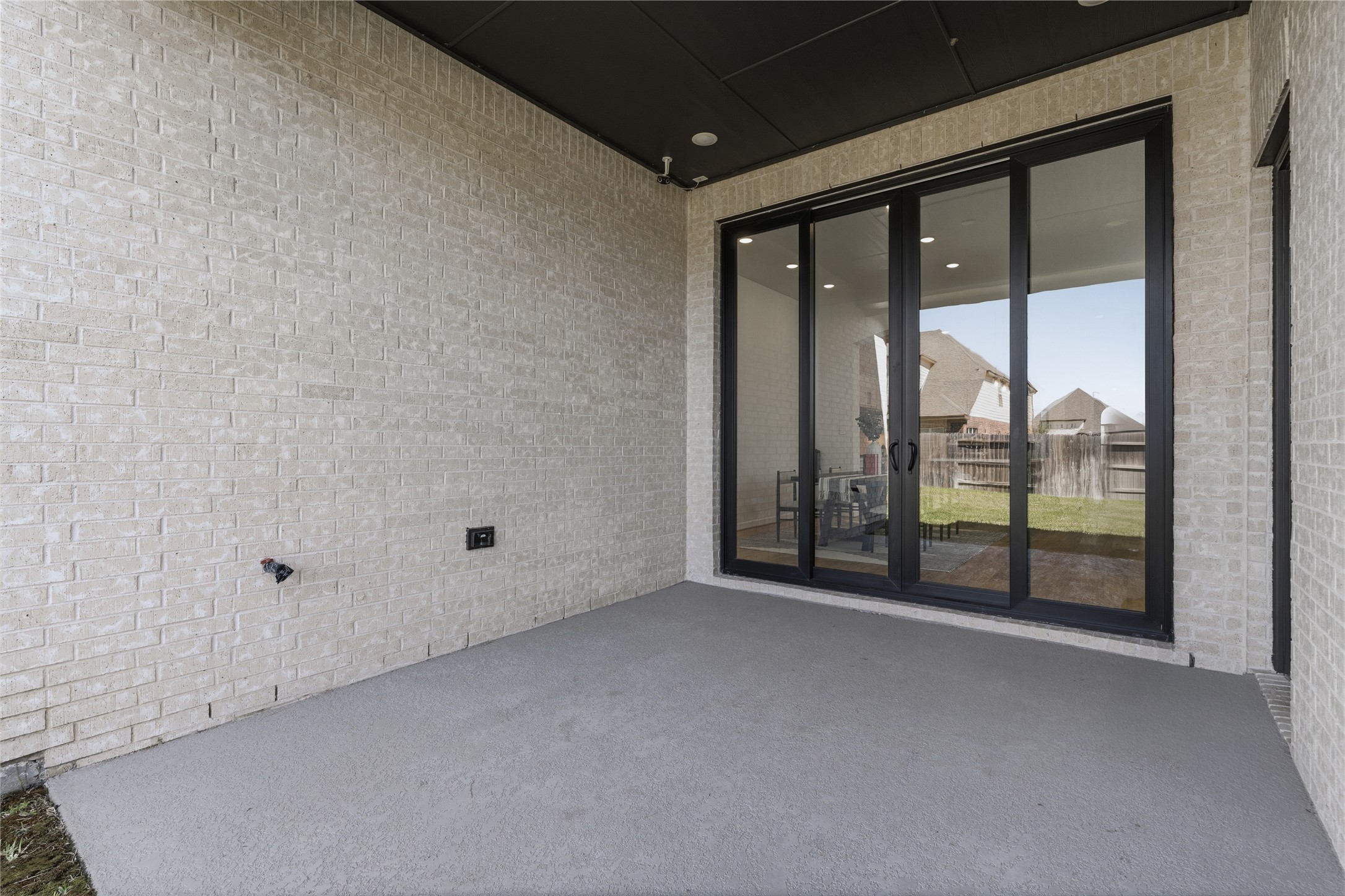 416 Bartlett Street Webster, TX 77598 - Photo 40 of 49 Covered back patio with painted ceiling, brick walls, and gas connection