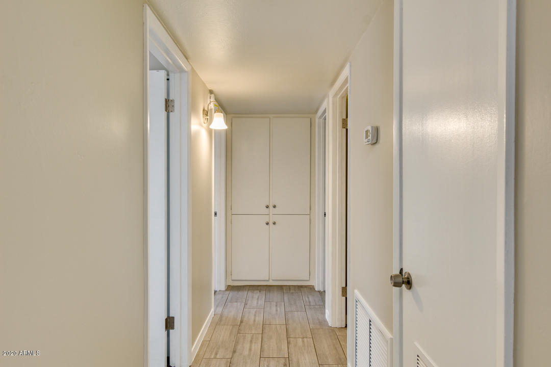 2128 West Keim Drive Phoenix, AZ 85015 - Photo 25 of 70 Wide Hallway with Linen Storage