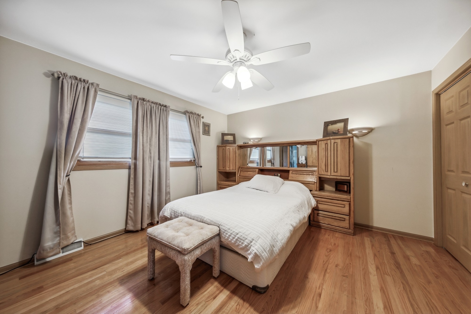 141 Hidden View Drive Westmont, IL 60559 - Photo 11 of 19 a bedroom with a bed and a large window