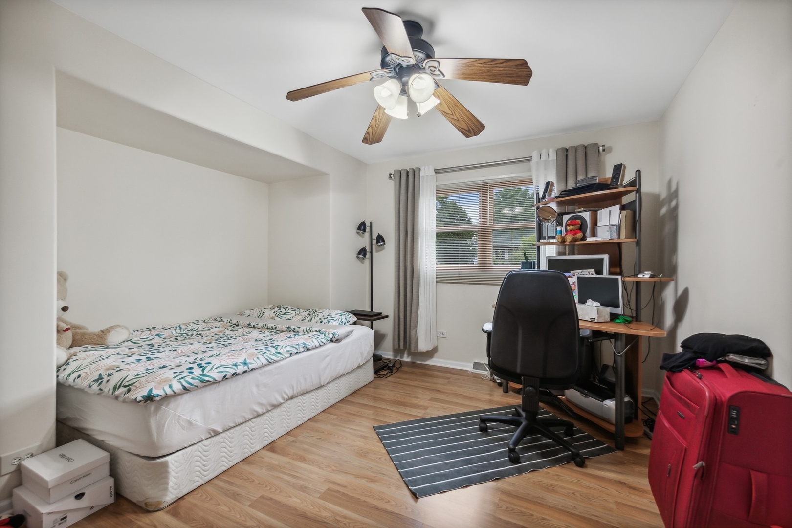 141 Hidden View Drive Westmont, IL 60559 - Photo 13 of 19 a bedroom with furniture and a window