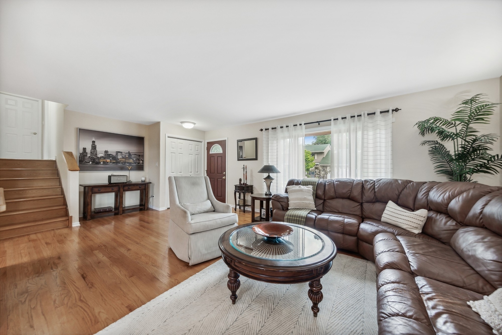 141 Hidden View Drive Westmont, IL 60559 - Photo 2 of 19 a living room with furniture and a large window