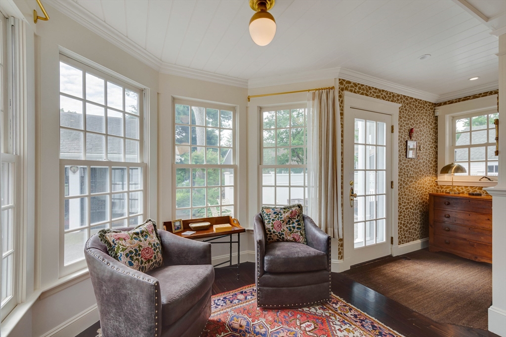 24 Cleveland Road Needham, MA 02492 - Photo 13 of 42 a living room with furniture and a window