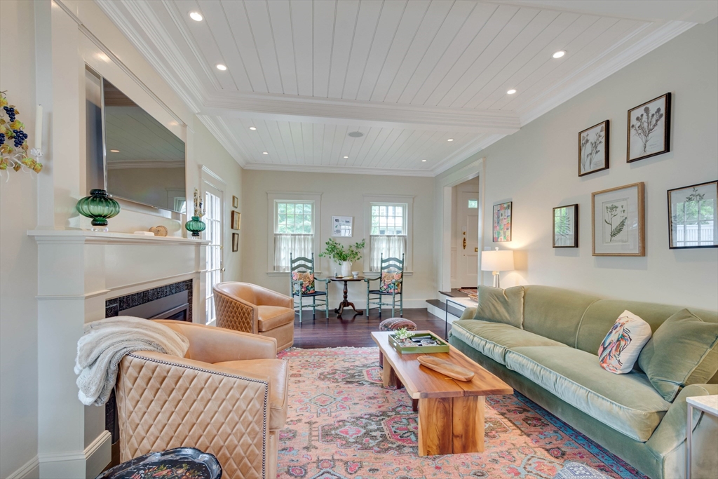 24 Cleveland Road Needham, MA 02492 - Photo 17 of 42 a living room with furniture or couch and a fireplace