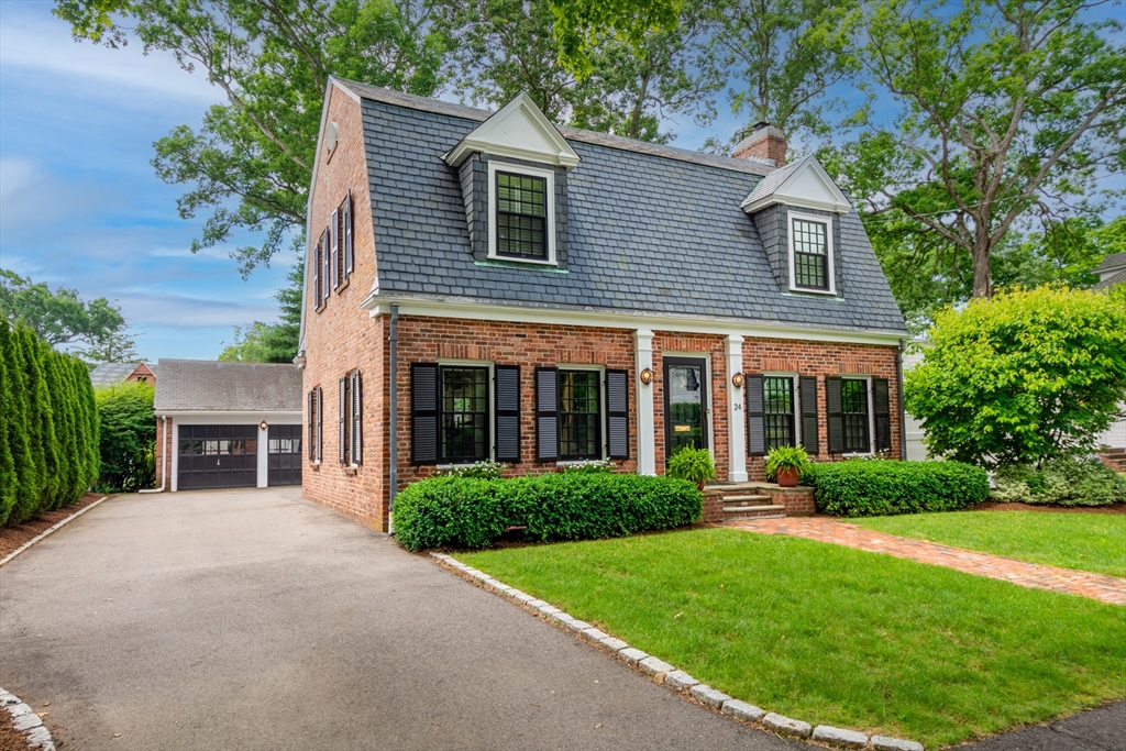 24 Cleveland Road Needham, MA 02492 - Photo 2 of 42 a view of a house with garden and yard